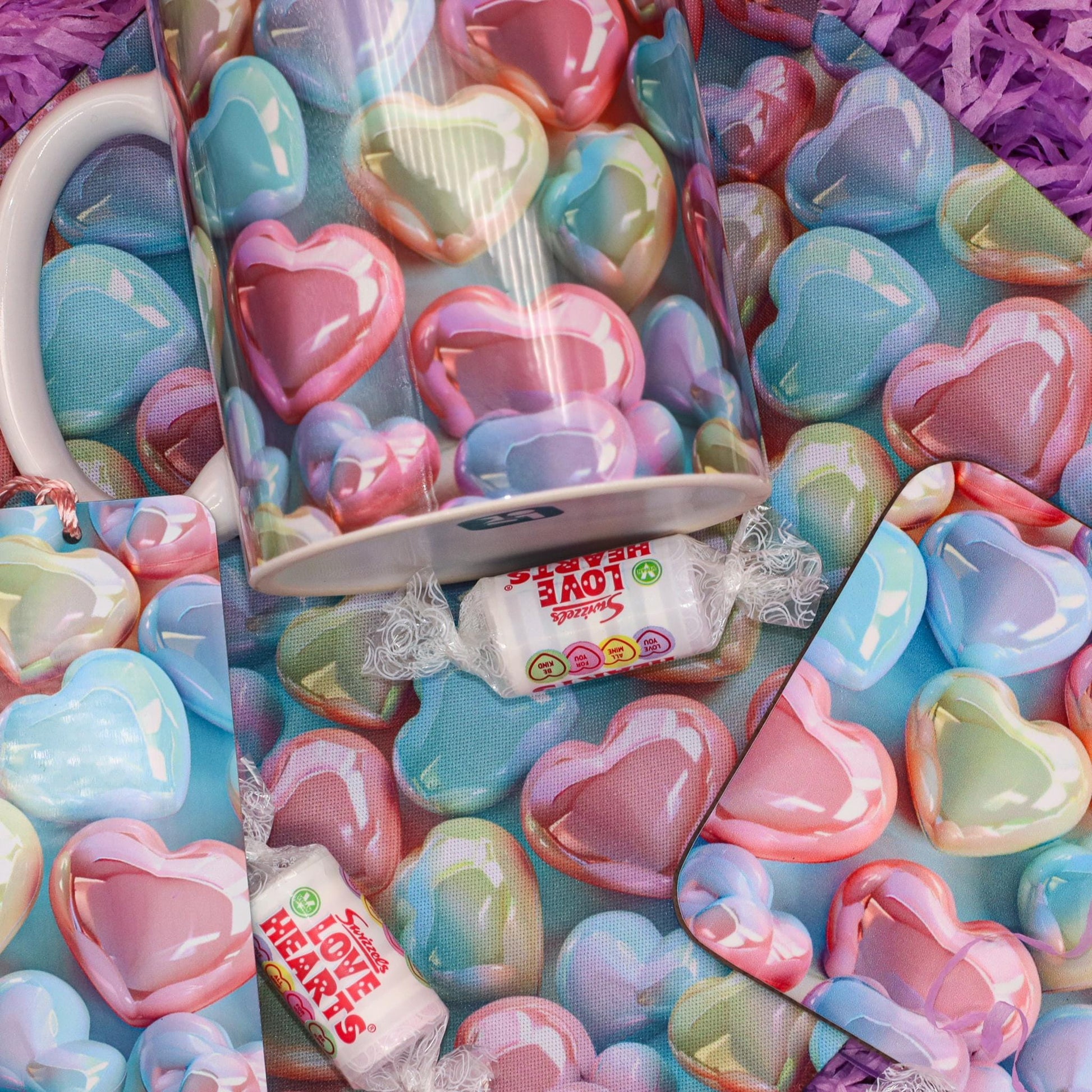 Photo showcasing the Candy Hearts themes products, include mug, coaster, mousemat and bookmark