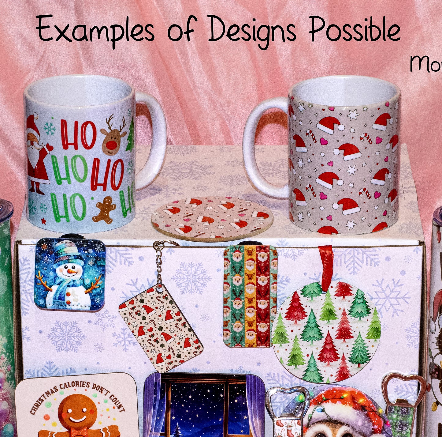 A collection of Christmas-themed mugs and matching accessories displayed on a box against a pink fabric backdrop. The mugs feature holiday prints including Santa, reindeer, candy canes, and snowflakes, with the text 'Examples of Designs Possible' at the top.