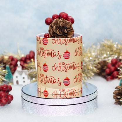 A ceramic White mug with MERRY CHRISTMAS and babbles on a beige background