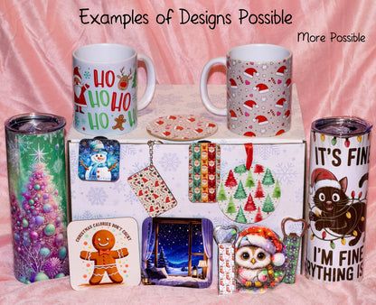 A collection of Christmas-themed printed designs displayed on mugs, coasters, cards, and tumblers, arranged around a central gift box on a pink fabric background. Text at the top reads 'Examples of Designs Possible' and 'More Possible'.