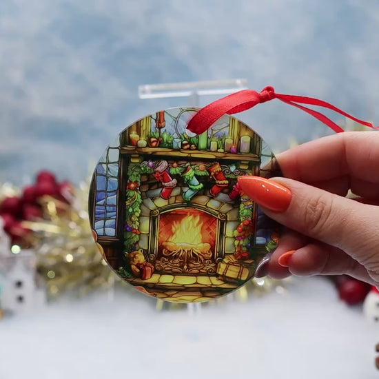 Video Showcasing a glass Christmas ornament showing a stainless effect stocking and fireplace scene