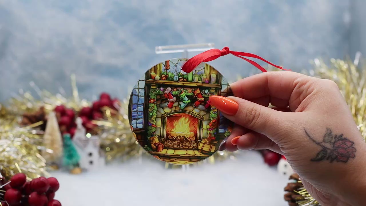 Video Showcasing a glass Christmas ornament showing a stainless effect stocking and fireplace scene