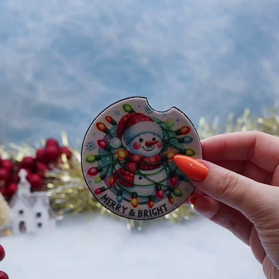 Video showcasing a car coaster featuring a Merry and Bright Cartoon snowman