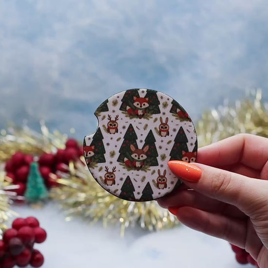 Video Showcasing two coasters. The first with Foxes and Owl surrounded by Christmas trees, the later featuring a fox, owl and rabbit surrounded by Christmas trees