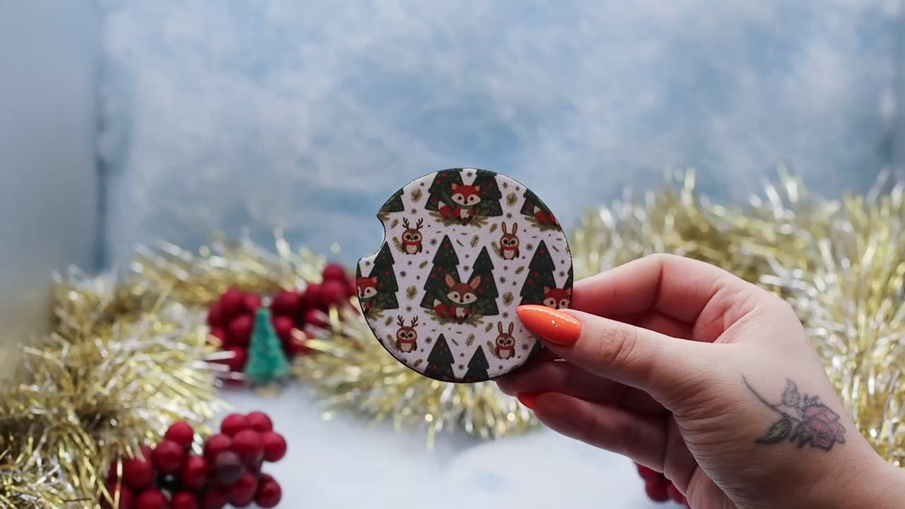 Video Showcasing two coasters. The first with Foxes and Owl surrounded by Christmas trees, the later featuring a fox, owl and rabbit surrounded by Christmas trees