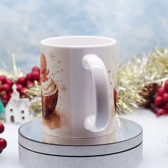 Video showcase a white ceramic mug with a gingerbread in cup
