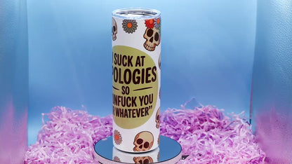 Video Showcasing A white insulated tumbler with a humorous skeleton graphic and text reading 'I SUCK APOLOGIES SO "UNFUCK YOURSELF OR WHATEVER"',