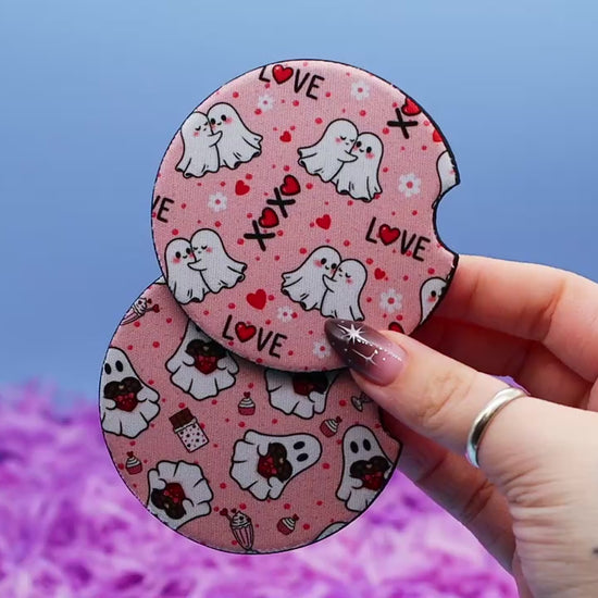Video showcasing two car coasters with valentine day ghosts