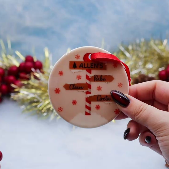 Video Showcasing a personalised name holiday ornament featuring family names