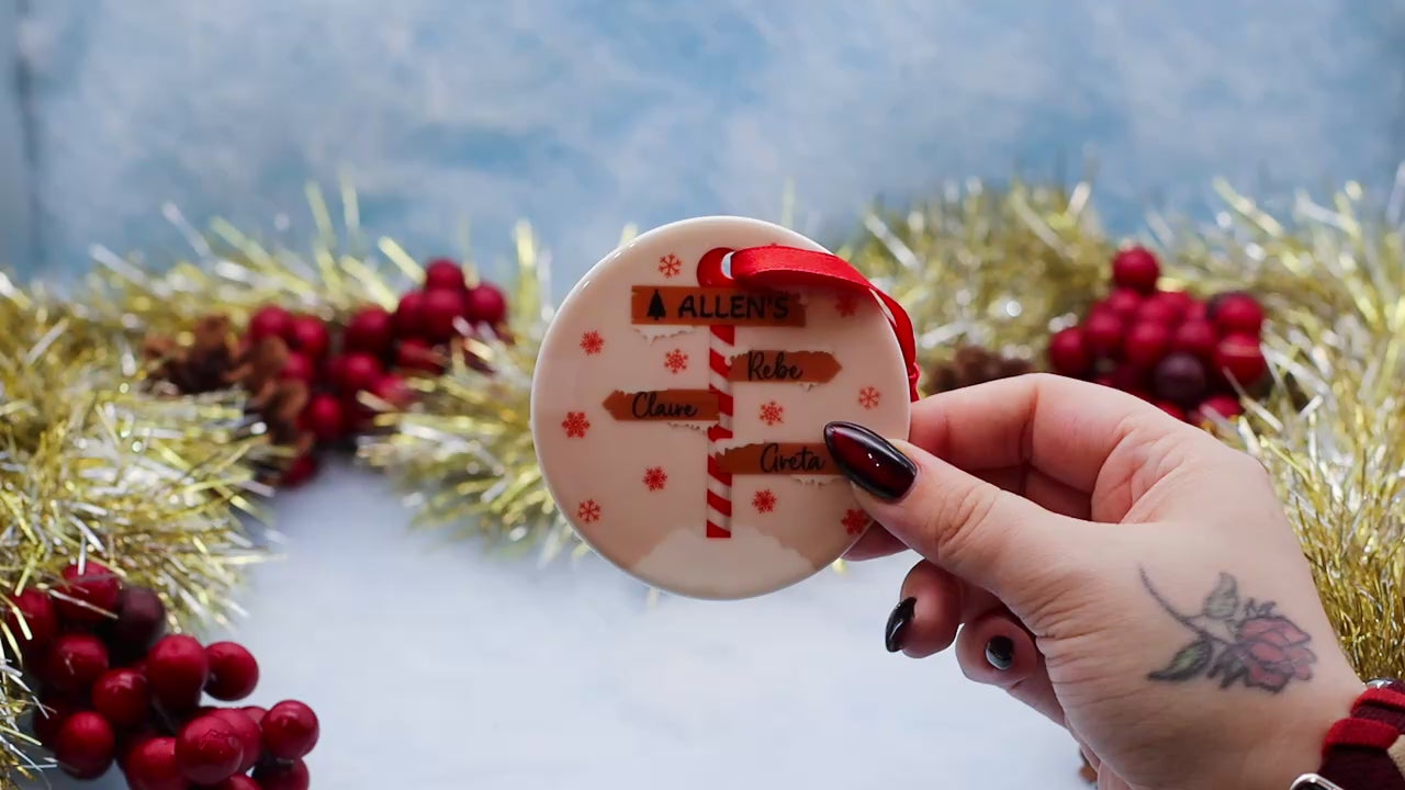 Video Showcasing a personalised name holiday ornament featuring family names
