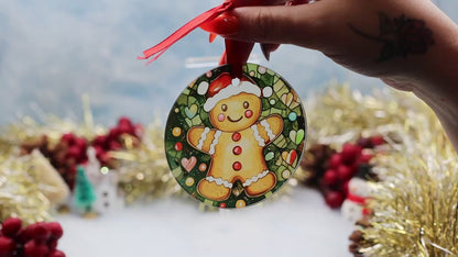 Video showcasing a glass frosted Christmas decoration with a gingerbread scene