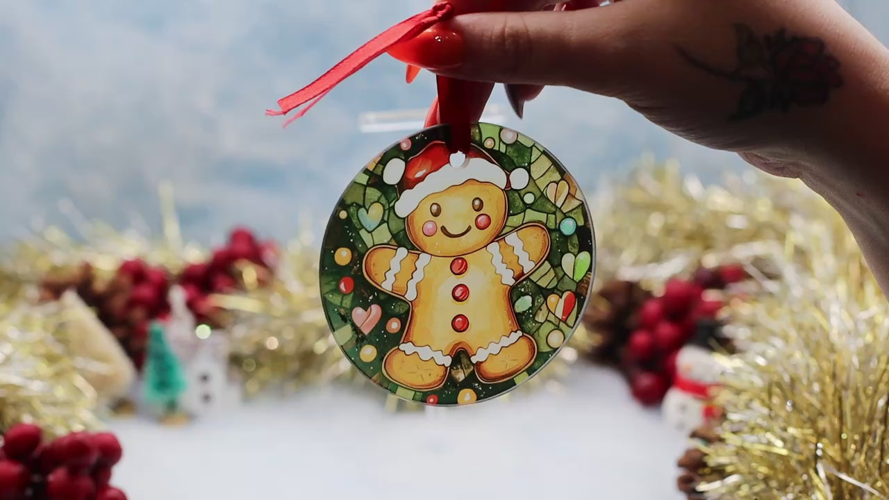 Video showcasing a glass frosted Christmas decoration with a gingerbread scene